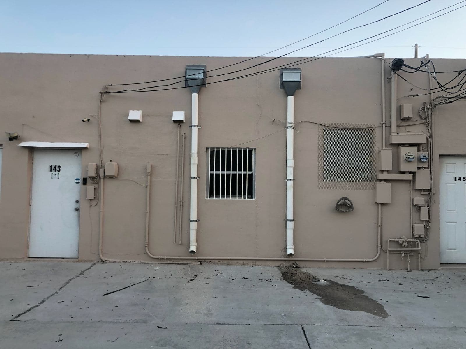 Exterior wall of a commercial building after cleaning — Finesse Cleaning, South Florida